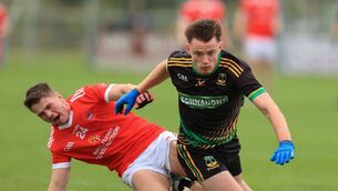 <p>Darragh Heneghan tries to escape from the clutches of Conor Lohan during Saturday afternoon's senior football championship quarter-final between Michael Glaveys and Pádraig Pearses at Lisnamult. Picture: Bernie O'Farrell</p> <p>Darragh Heneghan tries to escape from the clutches of Conor Lohan during Saturday afternoon's senior football championship quarter-final between Michael Glaveys and Pádraig Pearses at Lisnamult. Picture: Bernie O'Farrell</p>