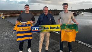 <p>John Mee, Club Rossie International Liaison, presents jerseys to Garry Galvin and Ryan Donoghue, who are both originally from Tulsk. </p>