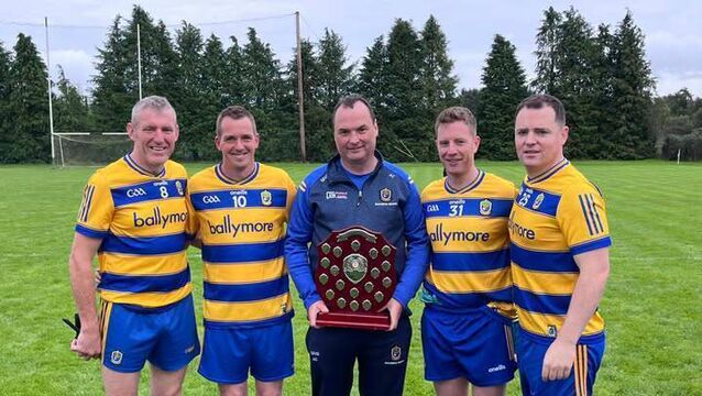<p>Roscommon Masters football manager, Anthony Carroll, with Kilmore players Dermot Foley, Gary Connellan, Damian Tiernan and Paddy McCormack following Saturday's All-Ireland Masters Shield success against Meath in Drumlish. </p>