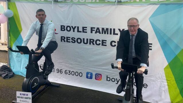 <p>POLITICAL RACE: Fine Gael colleagues Senator Gareth Scahill and Deputy Frank Feighan contribute some metres to Boyle FRC's Spin Bike Challenge. </p>
