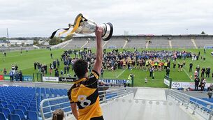 <p>THIS ONE IS FOR YOU: Four Roads captain, Tommy Morris, lifts the Mickey Cunniffe Cup in front of his team-mates and supporters as the Tisrara-based club is crowned Roscommon senior hurling champions for the 39th time at King and Moffatt Dr. Hyde Park on Sunday last. Pictures: Gerard O'Loughlin</p>