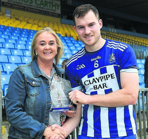 St. Dominic's centre-back, Micheál Byrne, has been named in the team, Here he is receiving his Player of the Match award after the county final from Ruth Connaughton, Kepak, competition sponsor. St. Dominic's centre-back, Micheál Byrne, has been named in the team, Here he is receiving his Player of the Match award after the county final from Ruth Connaughton, Kepak, competition sponsor.