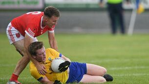 <p>Gavin Meares is tackled by Eoghan Keavney during the group stages meeting between St. Aidan's and Ballinameen in this year's Junior A Football Championship at Ballyforan. Picture: Gerard O'Loughlin </p> <p>Gavin Meares is tackled by Eoghan Keavney during the group stages meeting between St. Aidan's and Ballinameen in this year's Junior A Football Championship at Ballyforan. Picture: Gerard O'Loughlin </p>