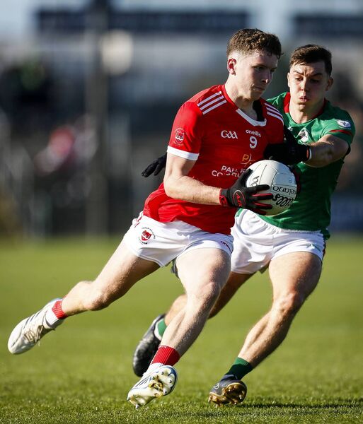 Declan Kenny, pictured here alongside Bobby Nugent, was instrumental in Pádraig Pearses reaching the county final. Picture: INPHO/Ashley Cahill