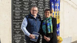 <p>Roscommon GAA Chairperson, Thomas Murray, with special guest, Eileen Fahey, at the official unveiling of a Patrons Wall at King and Moffatt Dr. Hyde Park on Saturday last. Picture: Roscommon GAA</p>