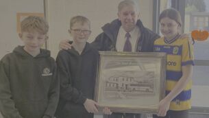 <p>Senior children from Abbeycartron NS, Elphin, Lauren, Aaron and Jonah presenting Pat with an engraved mirror.</p> <p>Senior children from Abbeycartron NS, Elphin, Lauren, Aaron and Jonah presenting Pat with an engraved mirror.</p>
