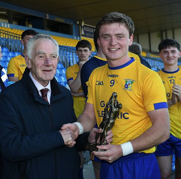 Gavin Meares, pictured here presented with his Player of the Match award by John Corcoran after the county Junior A final has been selected in our team Gavin Meares, pictured here presented with his Player of the Match award by John Corcoran after the county Junior A final has been selected in our team