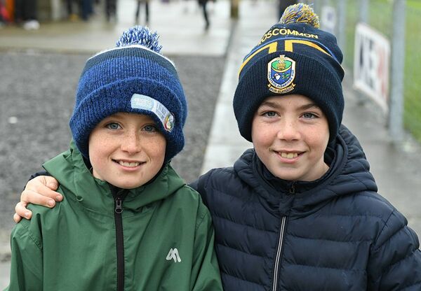 Cillian Crehan and Diarmuid Fallon supporting Oran during their Senior A camogie final against Athleague in Lisnamult. 